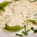 RAVIOLI ALLA CREMA DI NOCI at Ristorante Il Porcino
