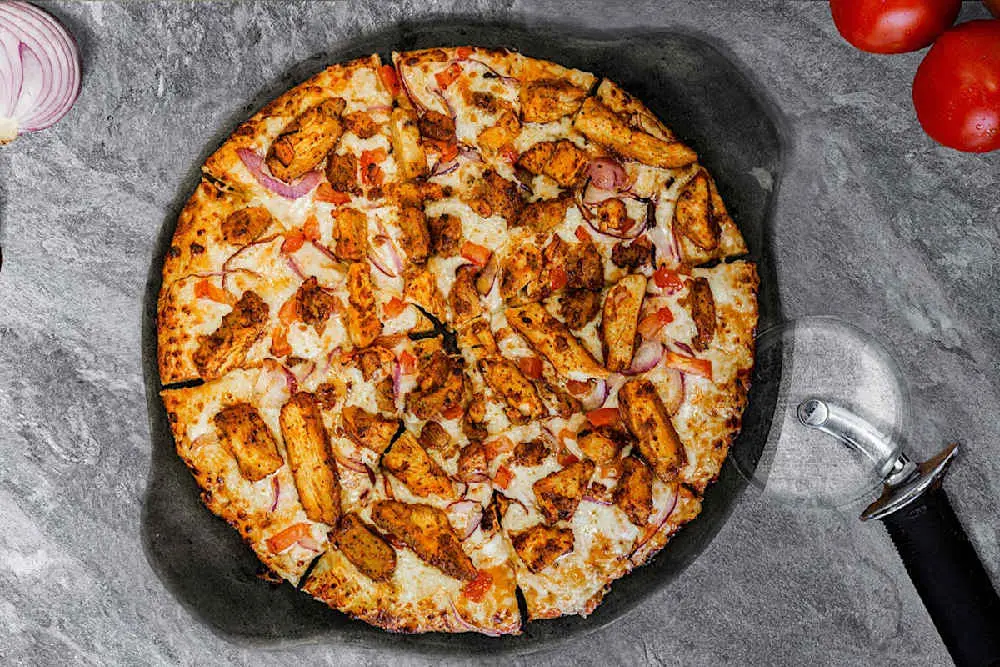 Malai Chicken at Curry Pizza House