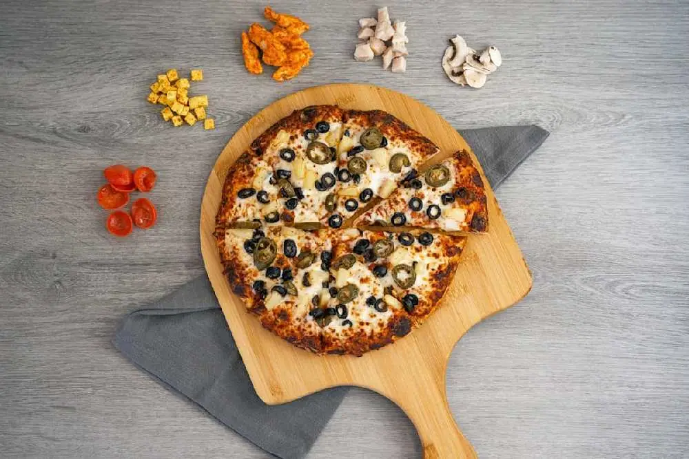 Build Your Own 1-Topping Pizza at Curry Pizza House