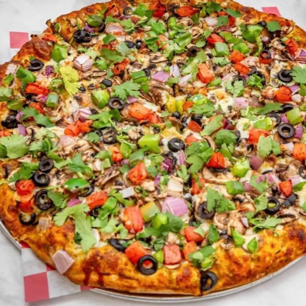 Special Curry Veggie Pizza at Desi Dough Pizza