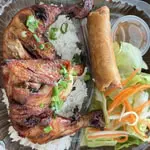 Roast Chicken French Style Over Rice at Dope pho