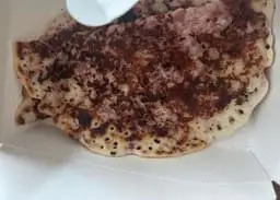 Onion Uthappam at Dosa Hut
