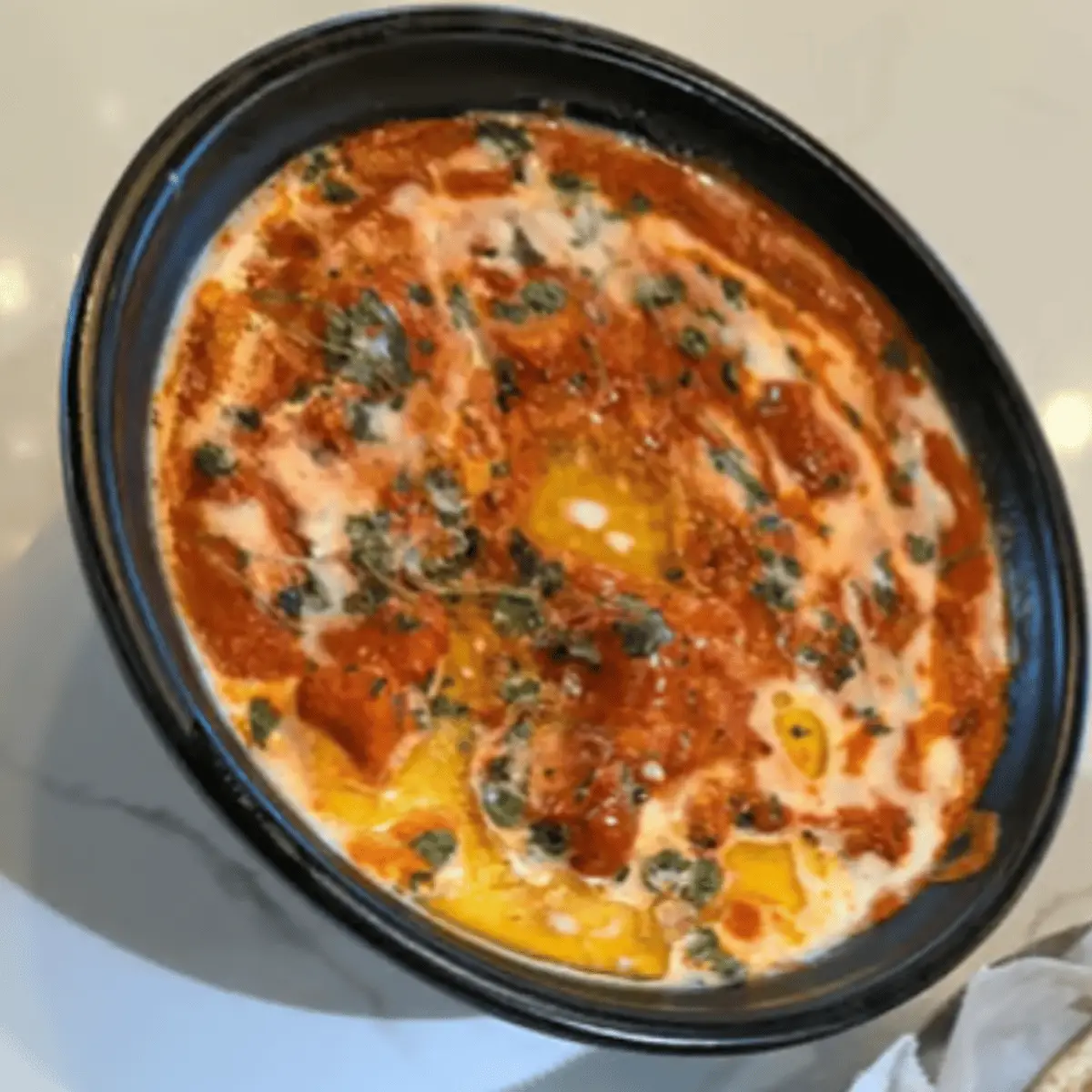 Butter Chicken at Falaknuma Indian Arabian Restaurant & Catering