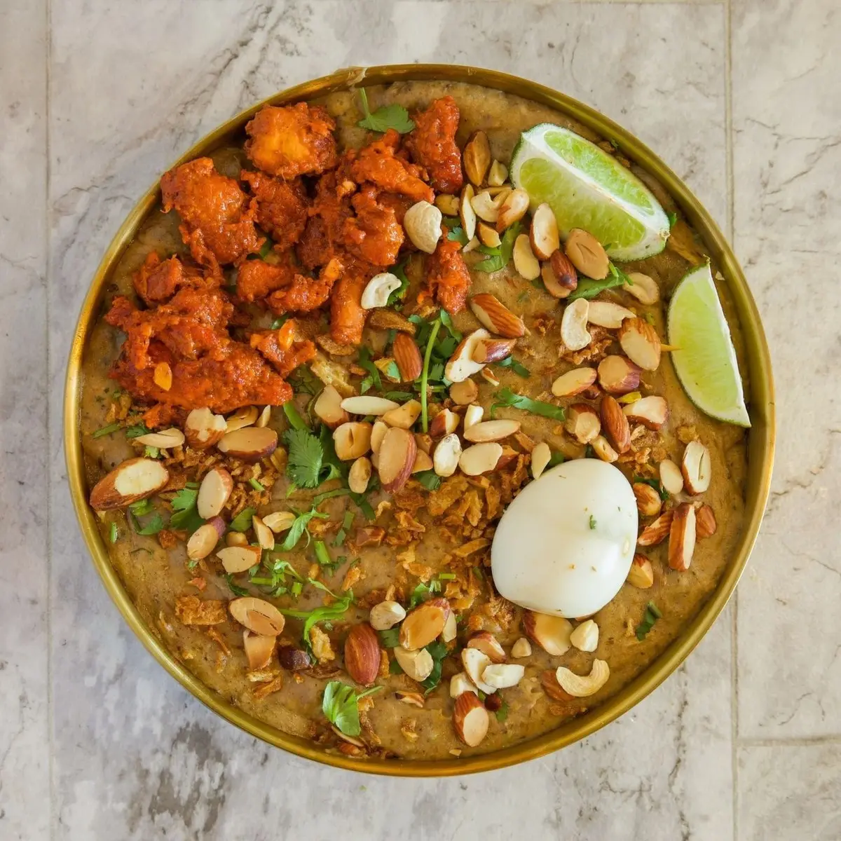 Mutton Haleem - (Jumbo) with Chicken 65 on sides at Falaknuma Indian Arabian Restaurant & Catering