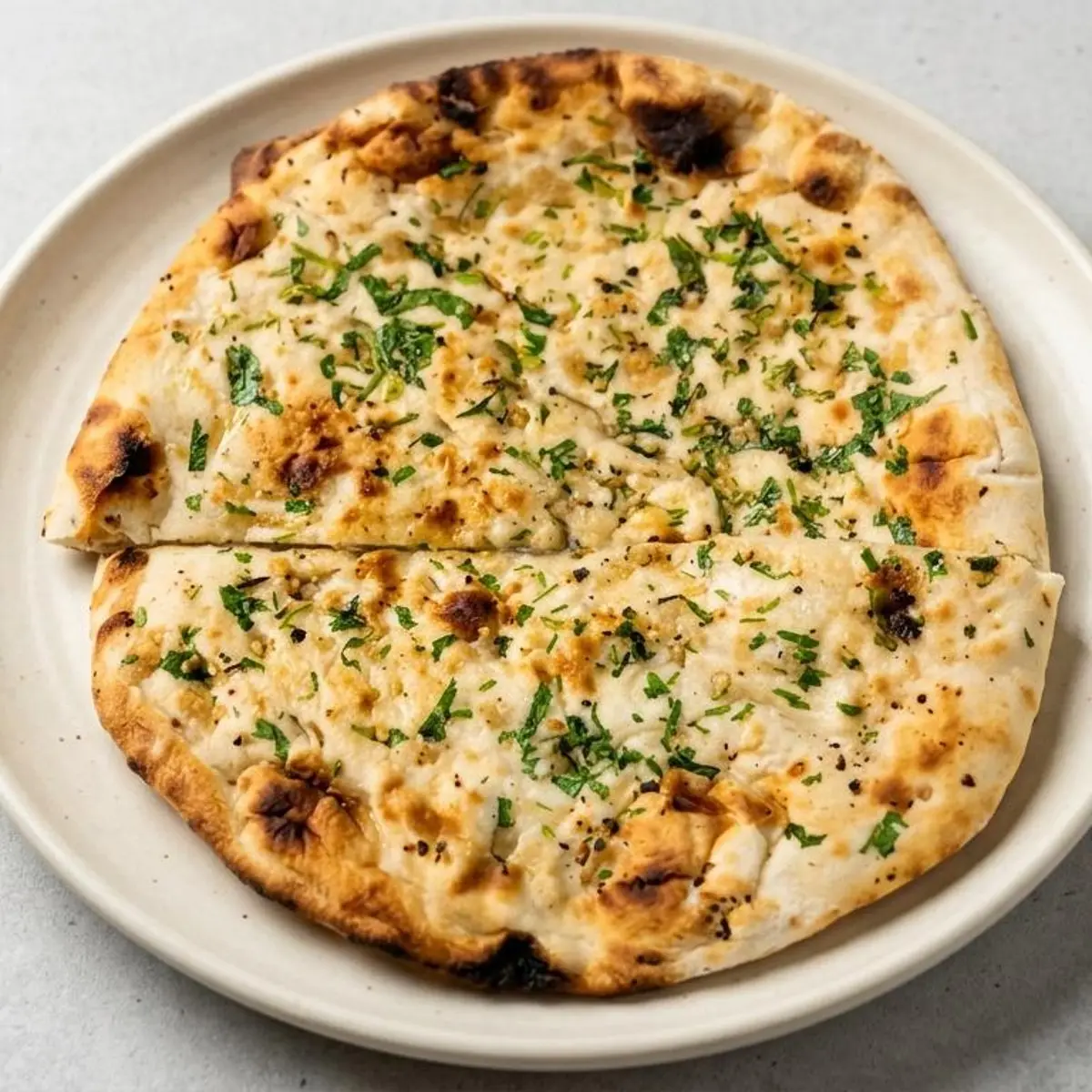 Naan ( Garlic) at Falaknuma Indian Arabian Restaurant & Catering