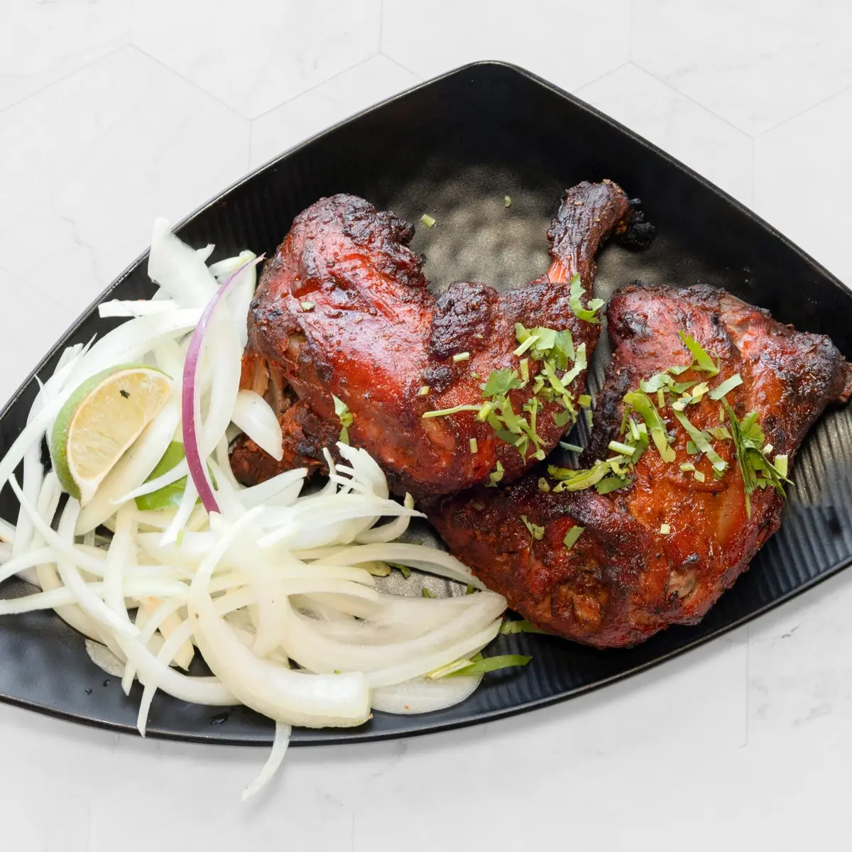 Tandoori Chicken (2 Pieces) at Falaknuma Indian Arabian Restaurant & Catering