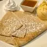 Crepe With Sauce at Frodo Joe's Petit Cafe