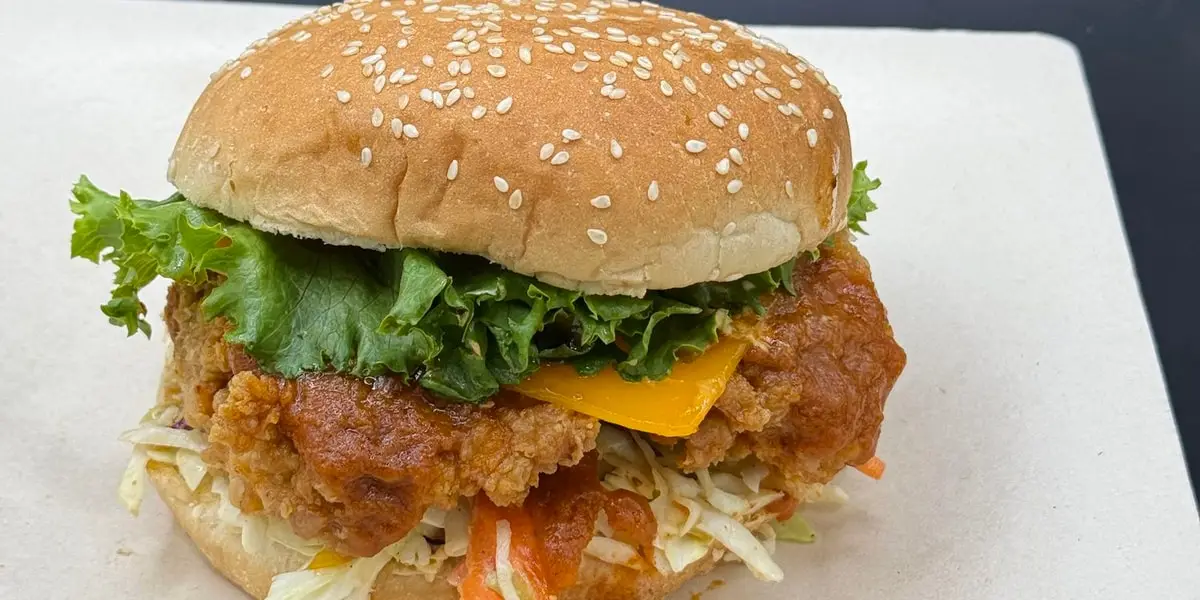 Crispy chicken burger at Hint of Desi