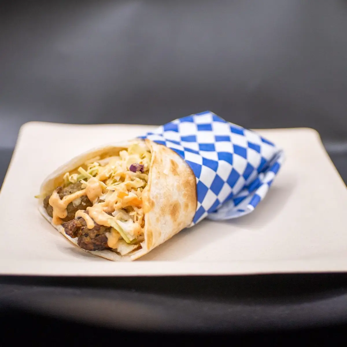 Lamb seekh kebab roll at Hint of Desi