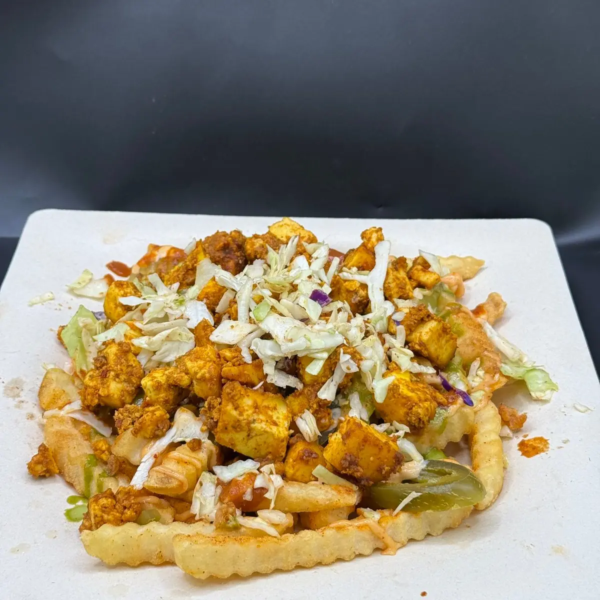 Paneer Tikka loaded fri at Hint of Desi