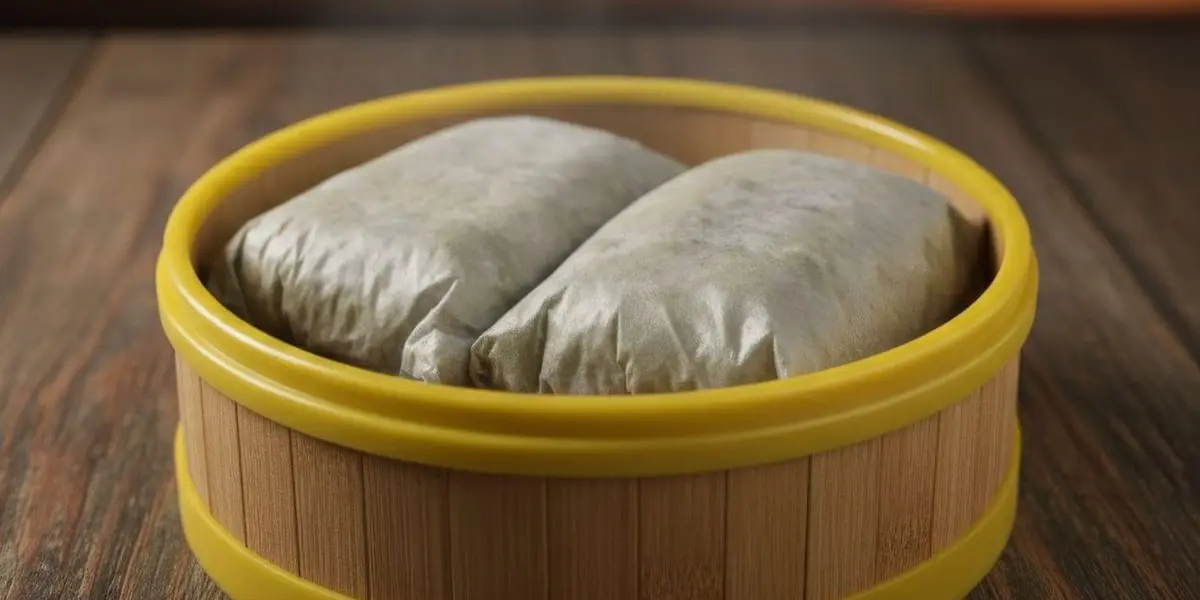 Pork Sticky Rice Lotus Leaf Wrap-糯米鸡 at Kung Fu Dim Sum