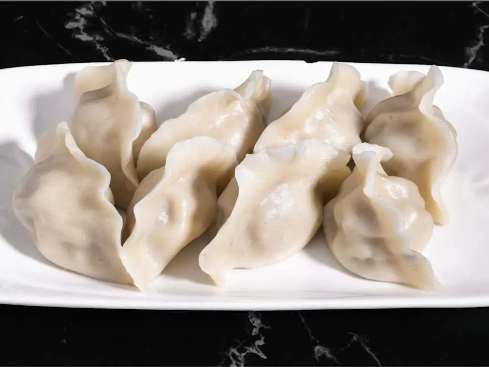 Boiled Mushroom Pork Dumpling(8) at M Dumpling