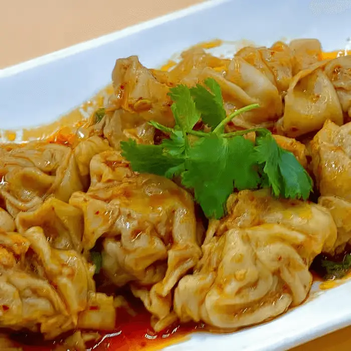 A17. Shrimp Wontons in Spicy Sauce 紅油炒手 at Milk & Honey Cafe