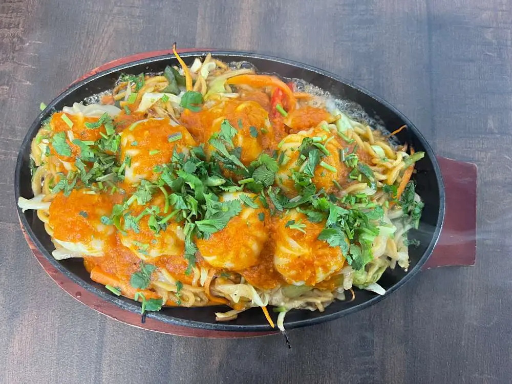 Grilled Sizzler Momo at Momo & Kebab