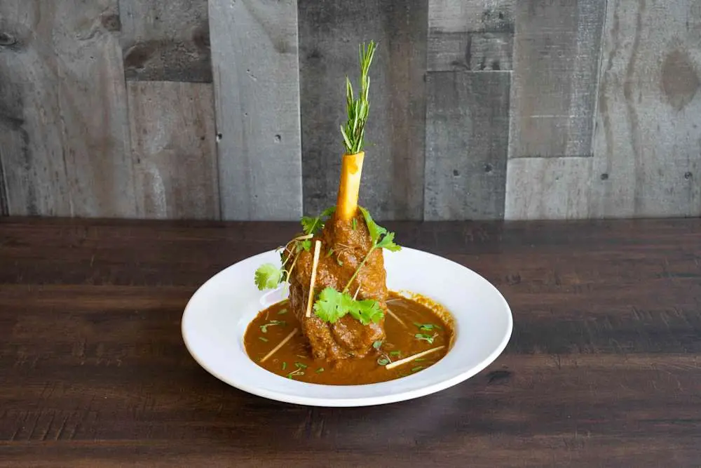 Lamb Shank In Gravy Sauce at Momo & Kebab