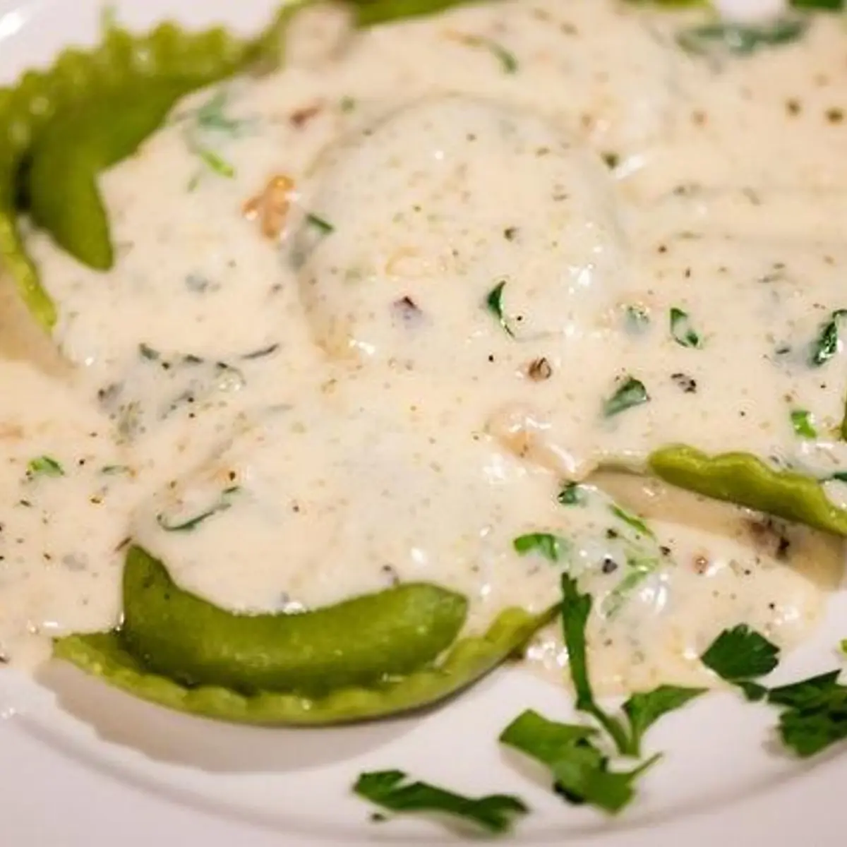 Ravioli Alla Crema Dl Noci at Ristorante IL Porcino