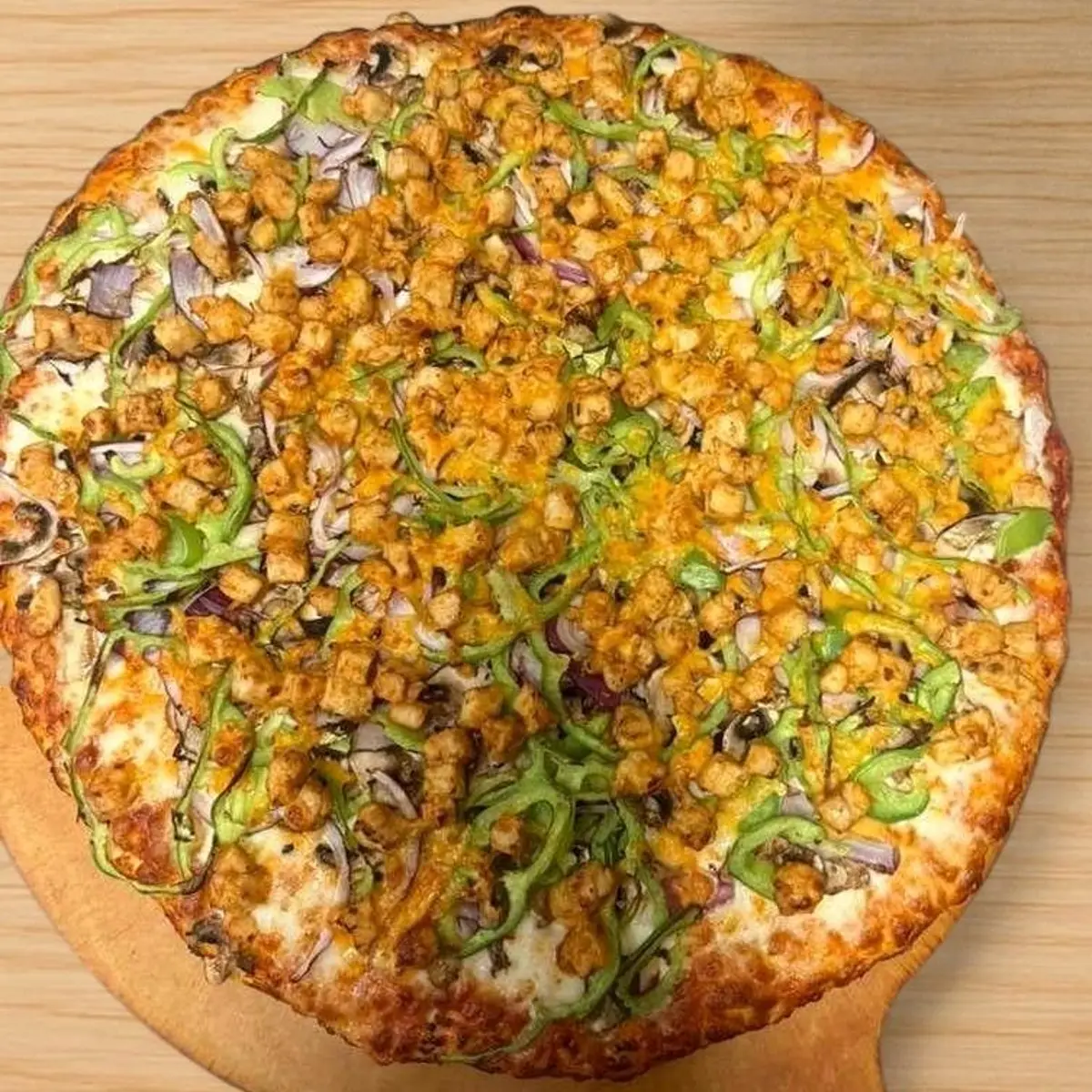 Dragonfire Chicken Pizza at Roll N Crust