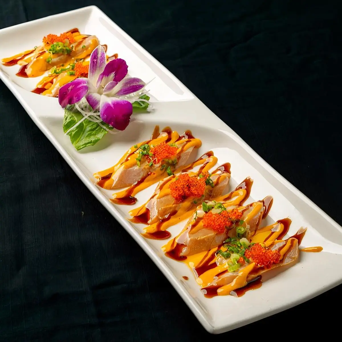 Hamachi Carpaccio at Toro Sushi Stone Grill & Bar
