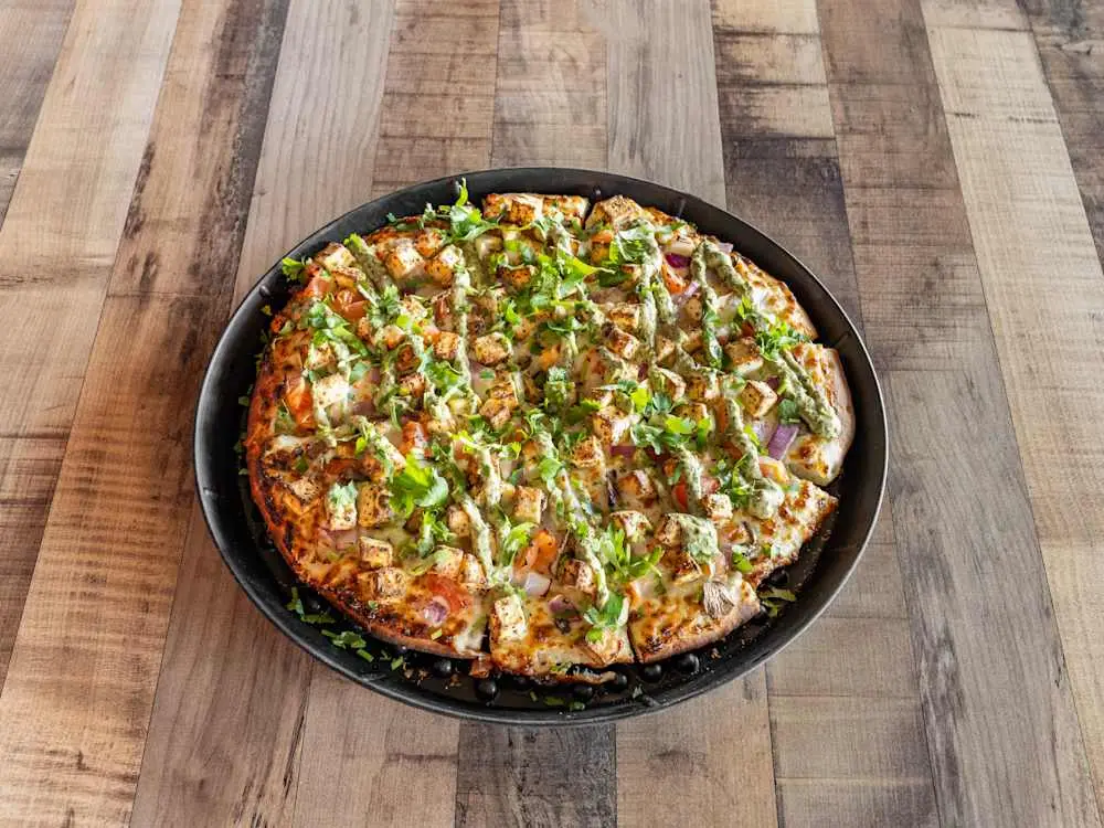 Lemon Pepper Paneer Pizza at Parktown Pizza Company