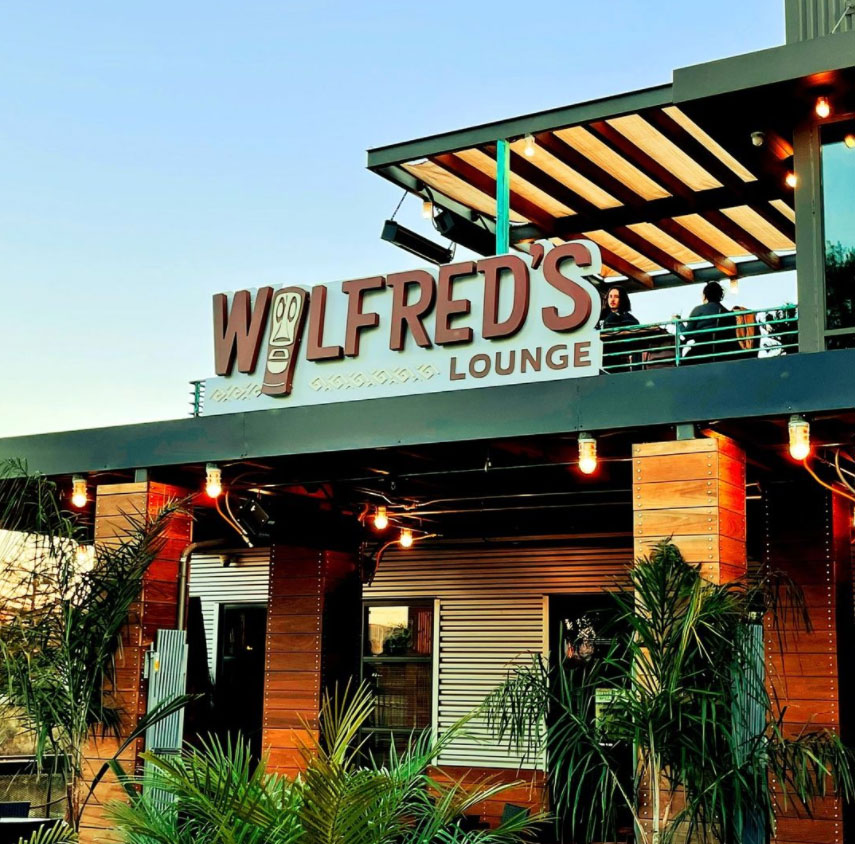 Happy hour food and drink specials at Wilfred's Lounge