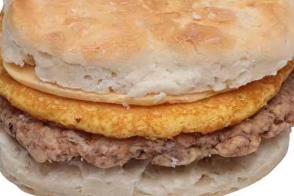 Egg, Sausage ＆ Cheese Biscuit Sandwich at Its a Grind Coffee House