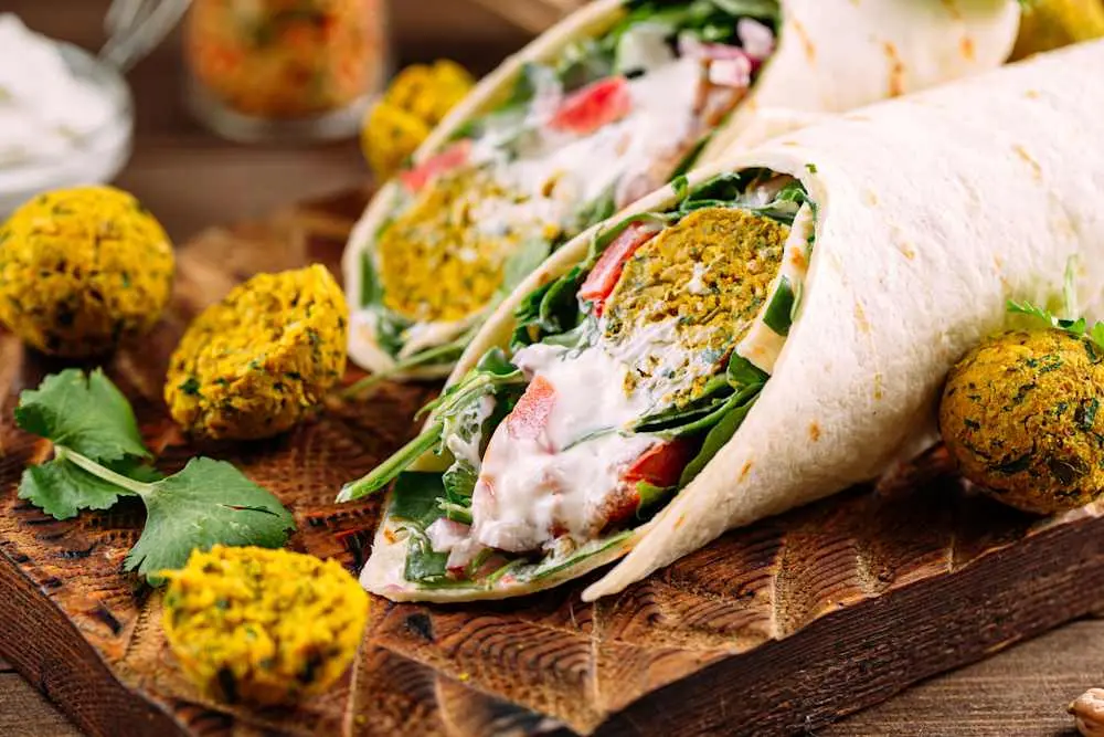 Mediterranean Drama Falafel Burrito (Vegan -New!) at Its a Grind Coffee House